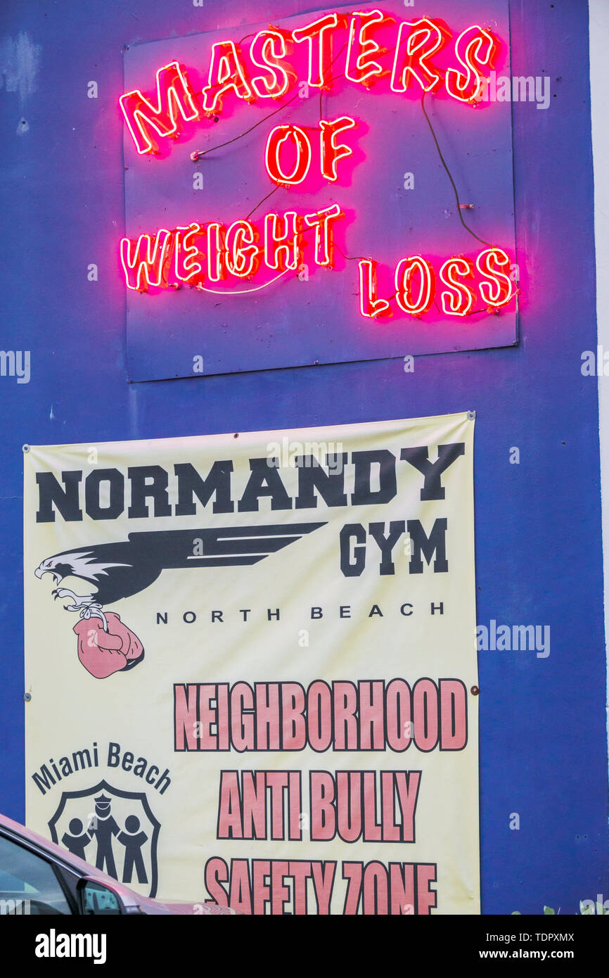 Miami Beach Florida,North Beach,Normandy Gym,neon,weight,weight loss,sign,neighborhood anti bullying campaign,FL190104074 Stock Photo