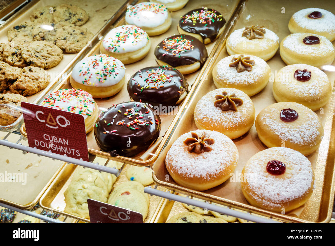 Miami Beach Florida,North Beach,CAO Bakery & Cafe Cuban American,inside interior,doughnut donut,sweets,sugar desserts,confections,trays,display sale,F Stock Photo