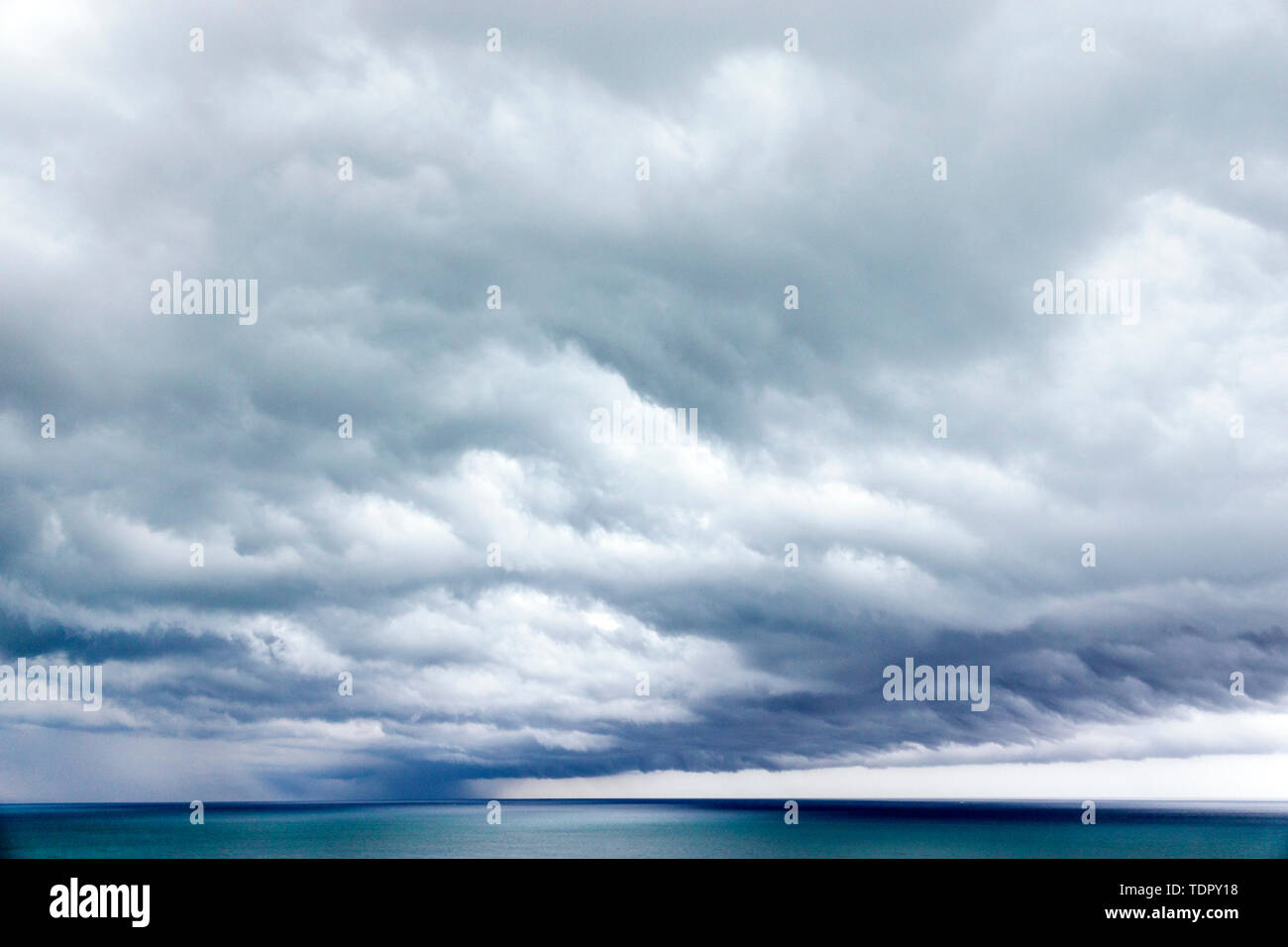 Miami Beach Florida,North Beach,Atlantic Ocean,storm clouds,rain,horizon,menacing sky,FL190505012 Stock Photo