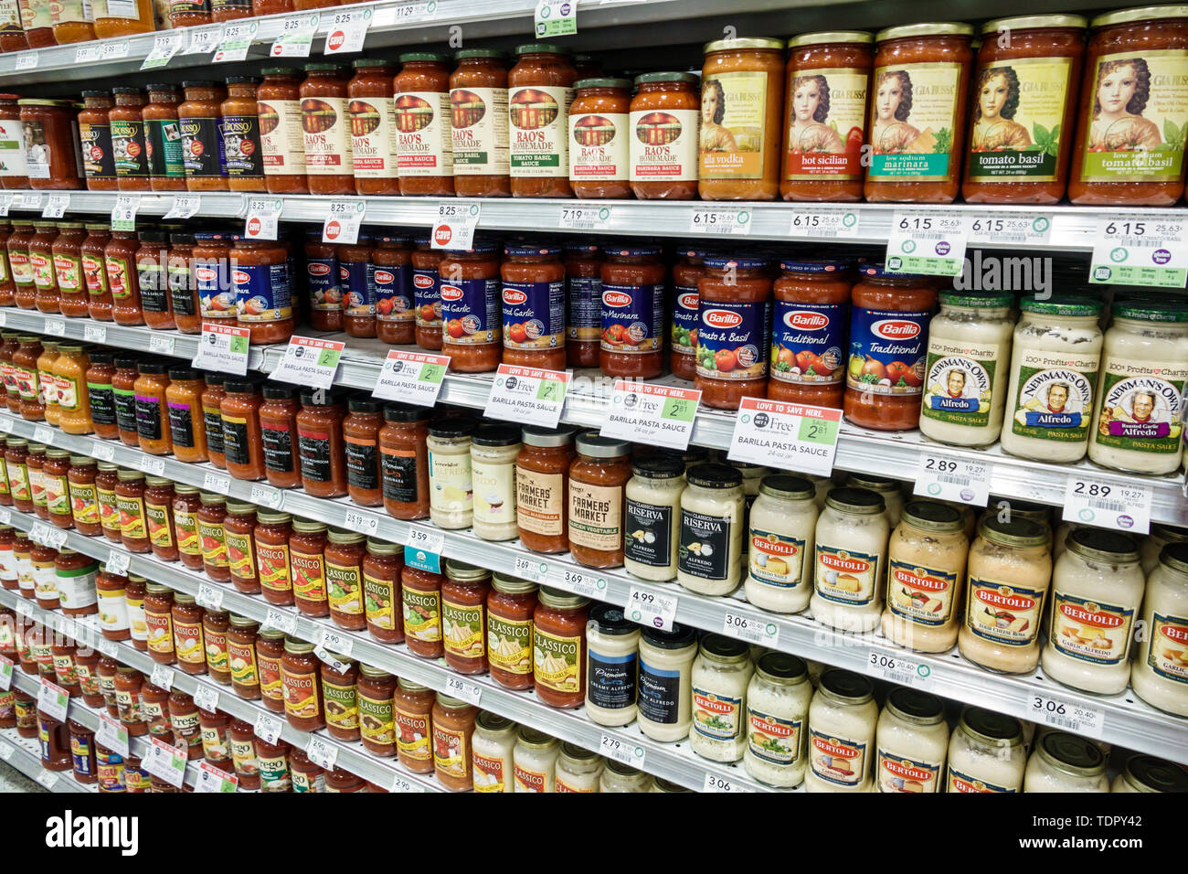 Miami Beach,North Beach,Publix,grocery store supermarket,inside interior,shelf shelves,pasta sauces,brands,Barilla,Bertolli,glass jars,BOGO,display sa Stock Photo