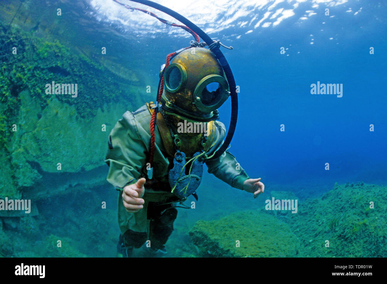 Helmet diver with historic equipment at seabed, Marseille, France Stock Photo