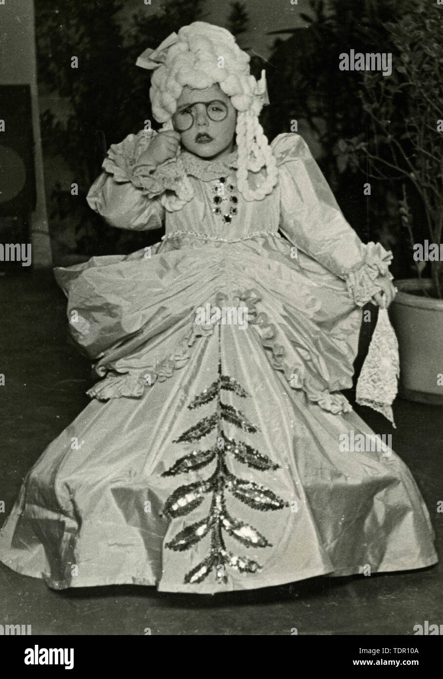 Child girl dressed for carnival, Italy 1940 Stock Photo