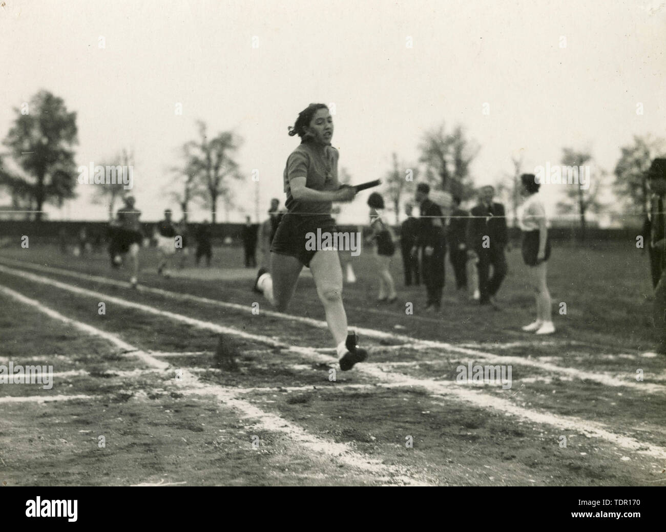 Women relay race arrival at Campo Sportivo FIAT, Turin, Italy 1936 Stock Photo