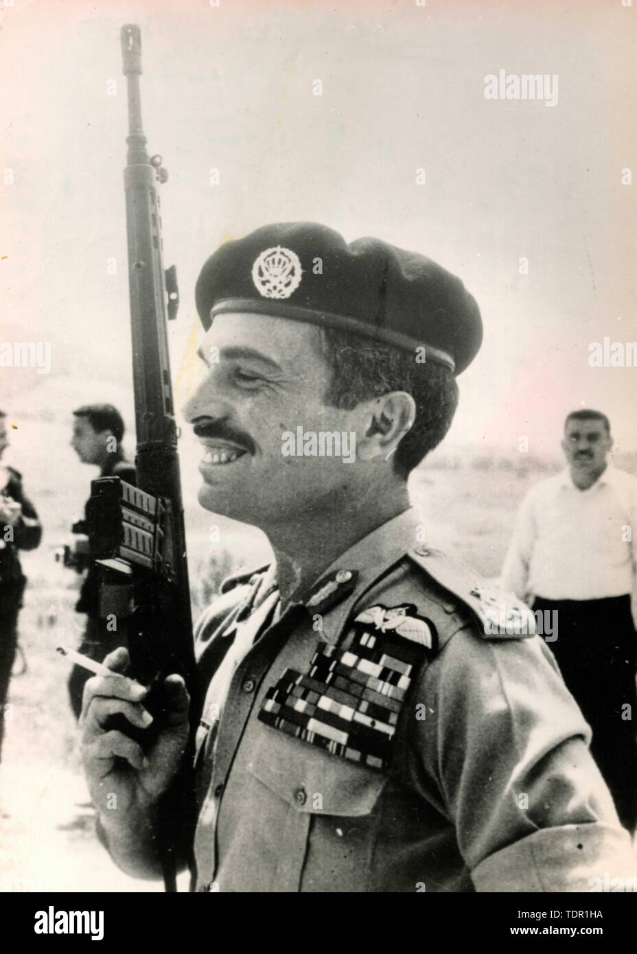 King Hussein of Jordan in uniform and machine gun, Jordan 1970 Stock Photo  - Alamy