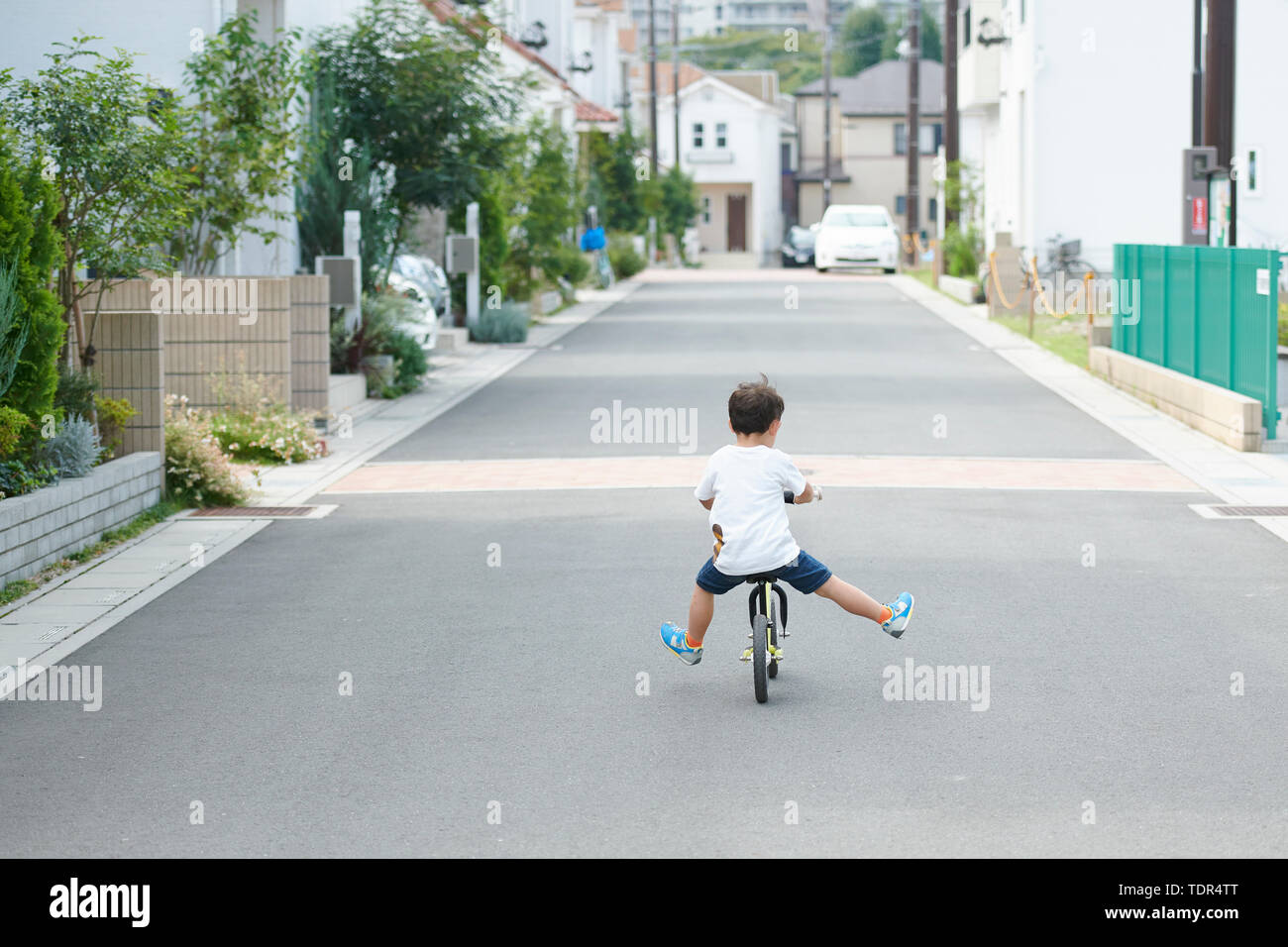 Japanese kid on a bike Stock Photo