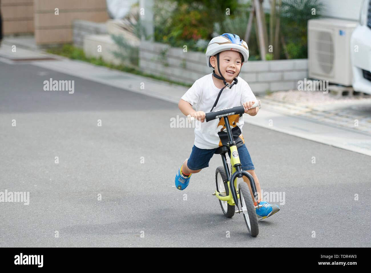 Japanese Kid On A Bike Stock Photo Alamy