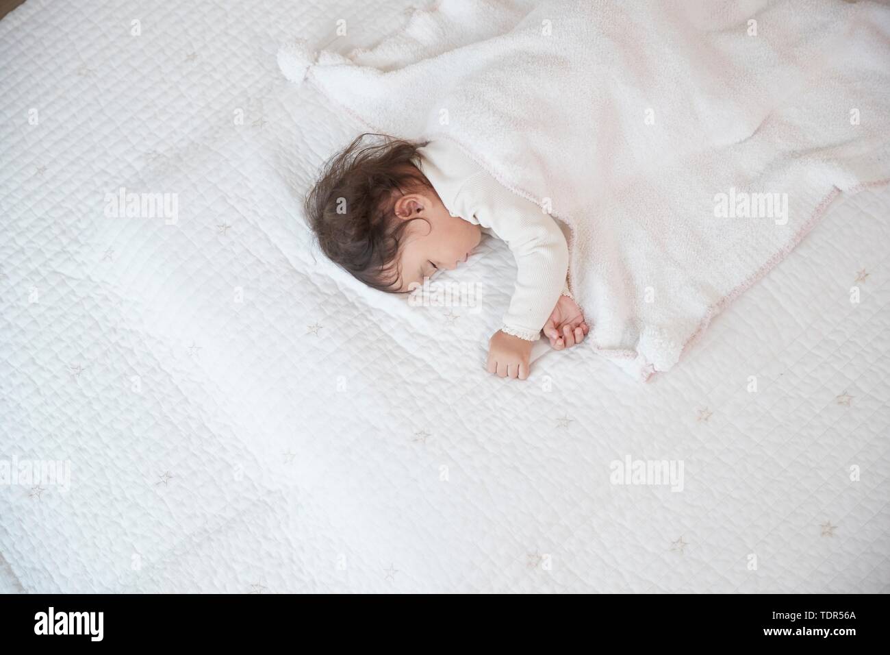 New born baby girl sleeping hi-res stock photography and images - Alamy