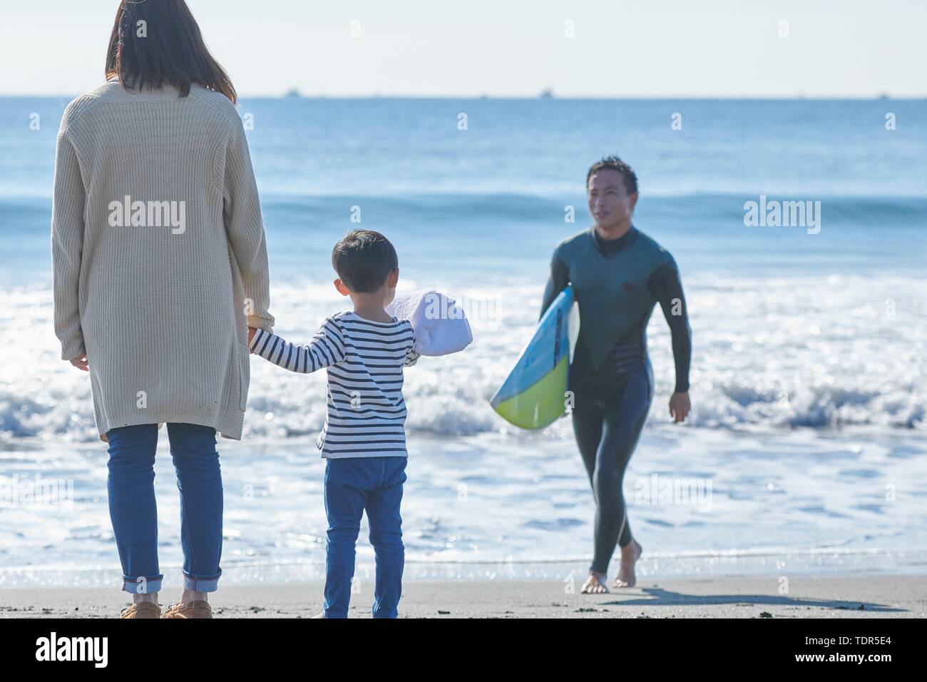 Japanese family at the beach Stock Photo