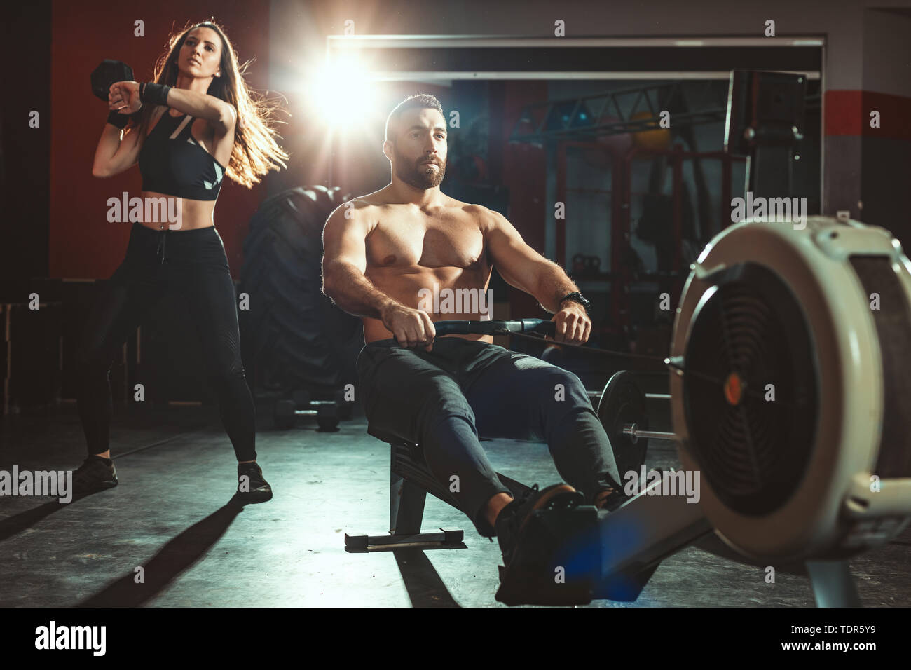 Dumbbell rower man hires stock photography and images Alamy