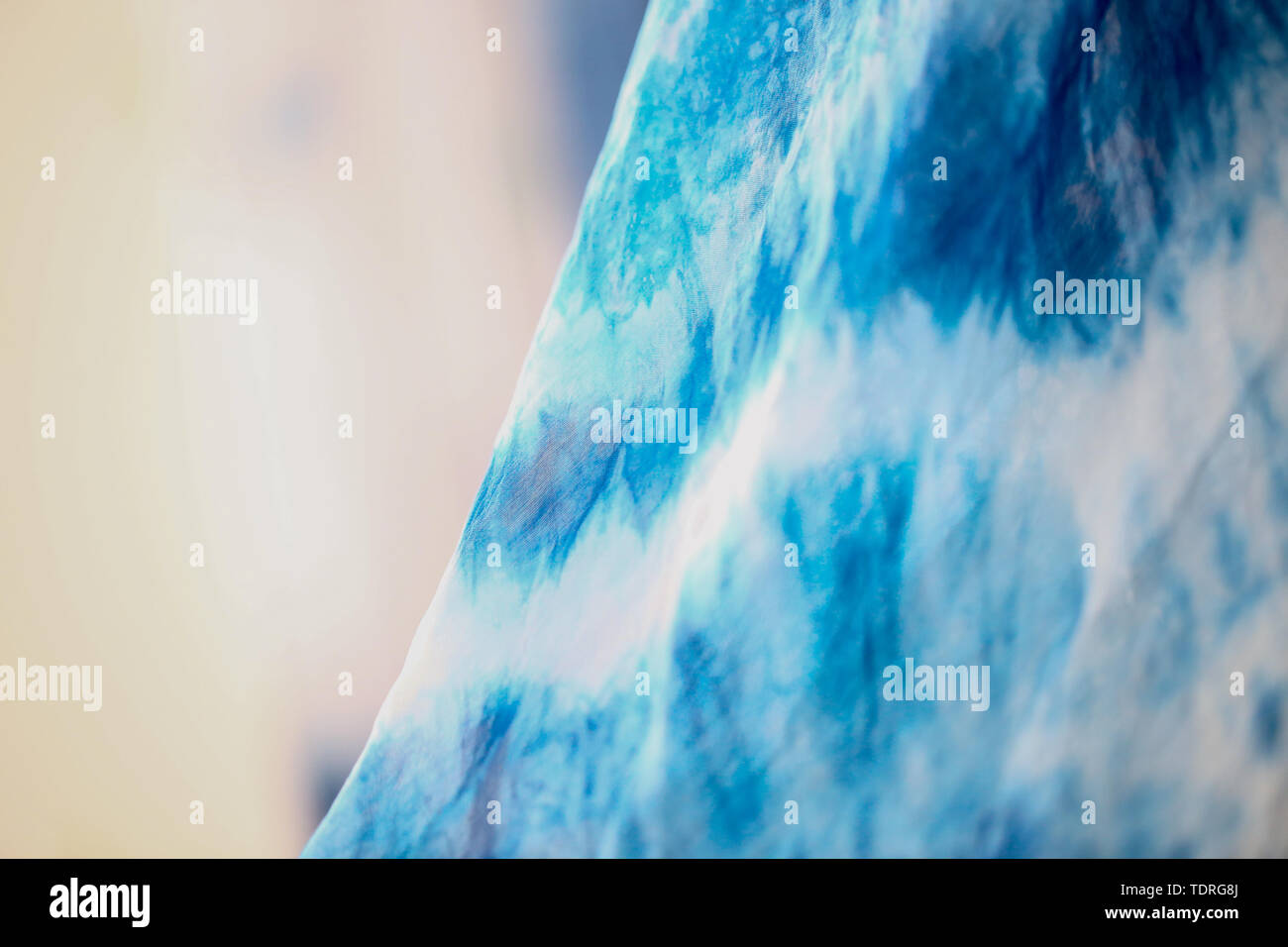 Batik braid glowing dots abstract background Stock Photo