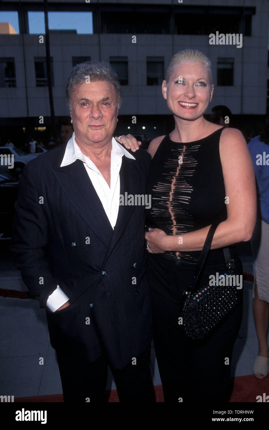 Jul 27, 1999; Los Angeles, CA, USA; Actor TONY CURTIS & wife JILL VANDENBERG @ the movie premiere of 'Thomas Crown Affair'..  (Credit Image: Chris Delmas/ZUMA Wire) Stock Photo
