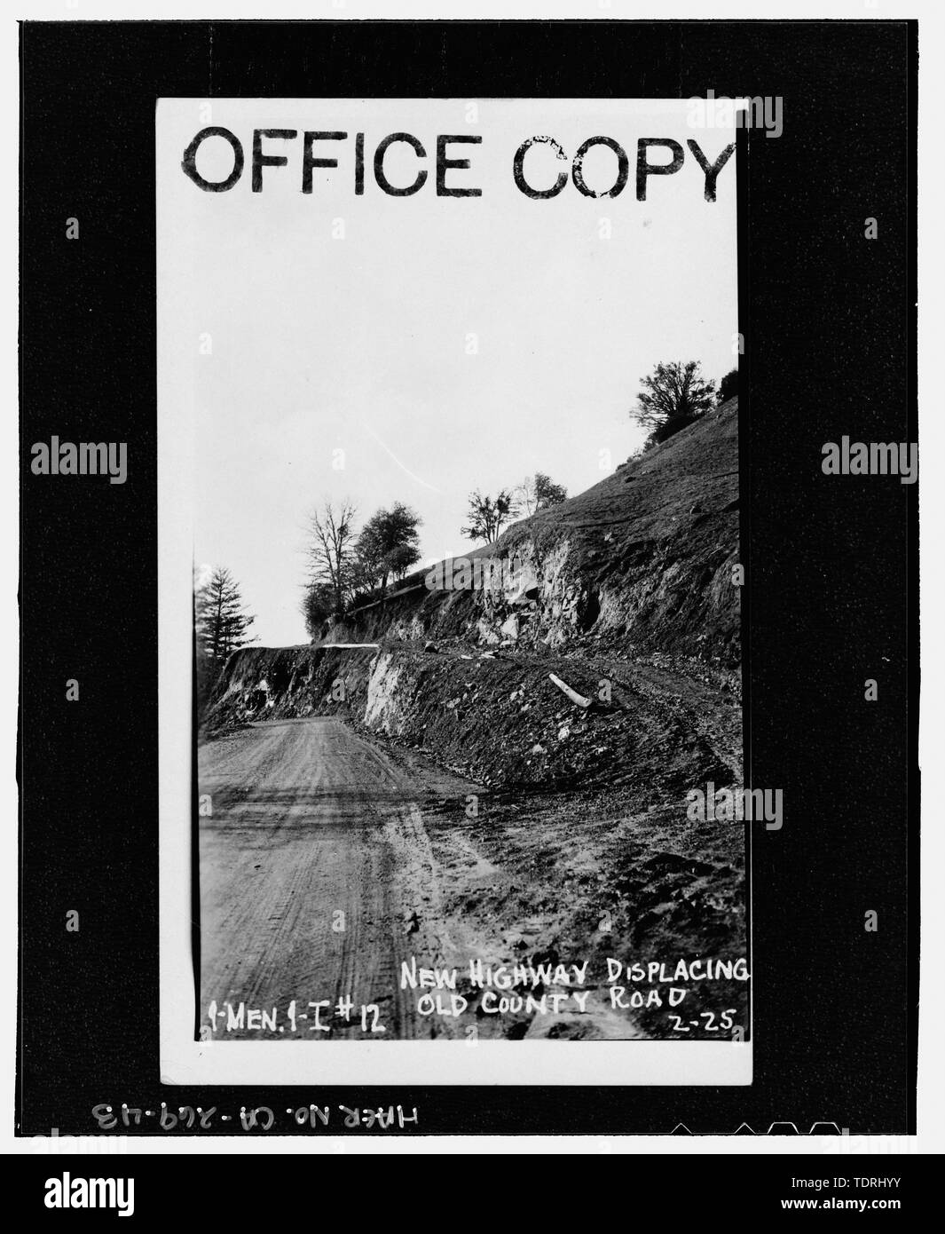 Photographer unknown February 1925 MENDOCINO COUNTY, SECTION, HIGHWAY 1. 1-MEN-1-1 -12, NEW HIGHWAY DISPLACING OLD COUNTY ROAD, 2-25. Stamped office copy. - Redwood National and State Parks Roads, California coast from Crescent City to Trinidad, Crescent City, Del Norte County, CA Stock Photo