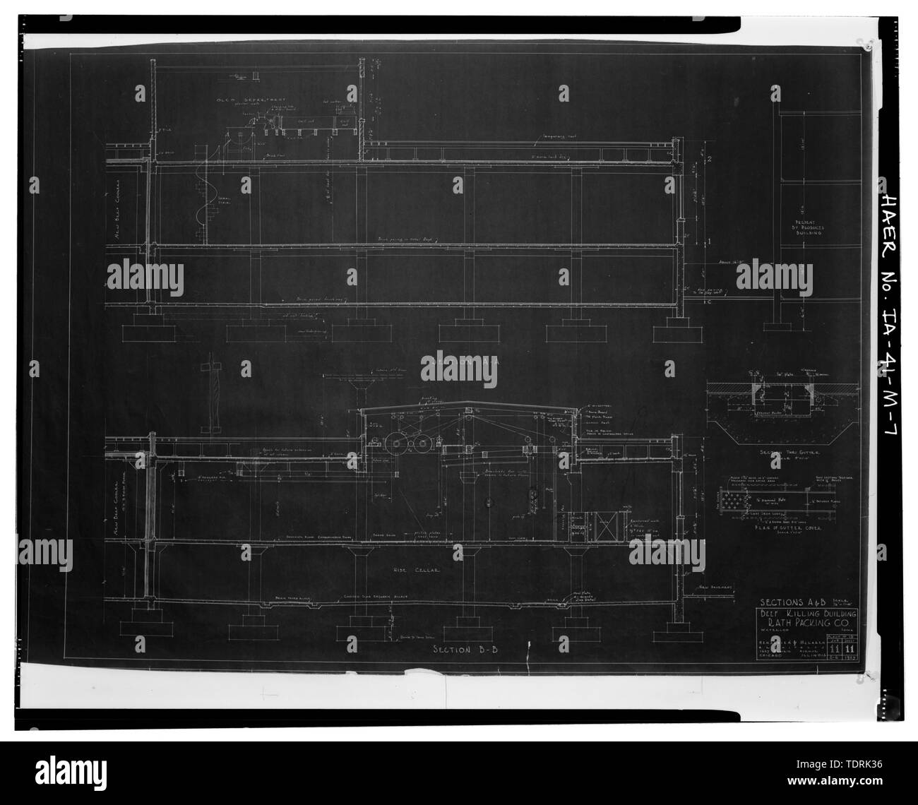 Photographic copy of blueprint dated 1929; Henschien and McLaren, Chicago, architects; Original in collection of Rath drawings and blueprints owned by Waterloo Community Development Board, Waterloo, Iowa; SECTION OF THE 1929 BEEF HOUSE, SHOWING HOISTING APPARATUS ABOVE SKINNING BEDS - Rath Packing Company, Cooler Building-1929 Beef House, Sycamore Street between Elm and Eighteenth Streets, Waterloo, Black Hawk County, IA Stock Photo