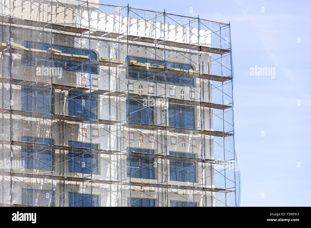 building under construction against blue sky. thermal insulation of a building Stock Photo