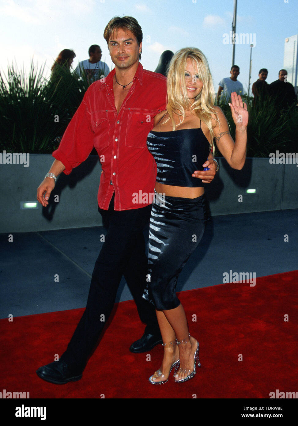 Jun 17, 2000; Los Angeles, California, USA; Actor PAMELA ANDERSON and bofriend MARCUS SCHENKENBERG @ the Oscar De La Hoya vs. Shane Mosley boxing match. (Credit Image: © Chris Delmas/ZUMA Wire) Stock Photo