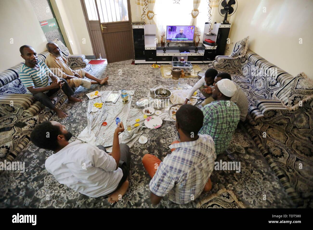Addis Ababa, Ethiopia. 11th June, 2019. Residents watch television at home in Adama, Ethiopia