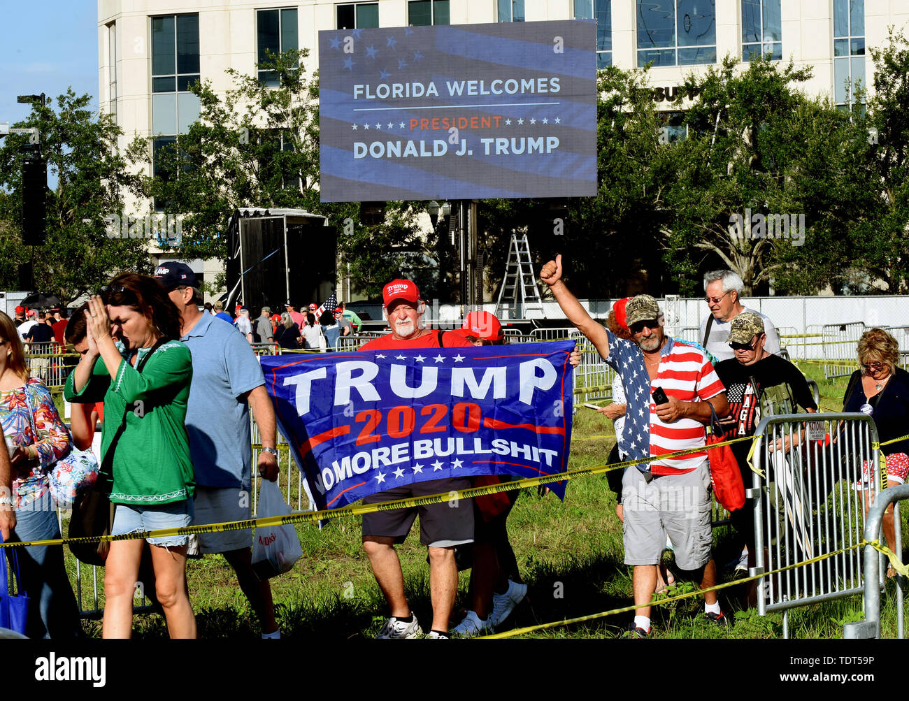 Orlando, Florida, USA. 18th June, 2019. Supporters of U.S. President Donald Trump arrive for a Make America Great Again rally at the Amway Center on June 18, 2019 in Orlando, Florida. The rally is billed as Trump's kick-off event for his campaign for re-election in 2020. (Paul Hennessy/Alamy) Credit: Paul Hennessy/Alamy Live News Stock Photo