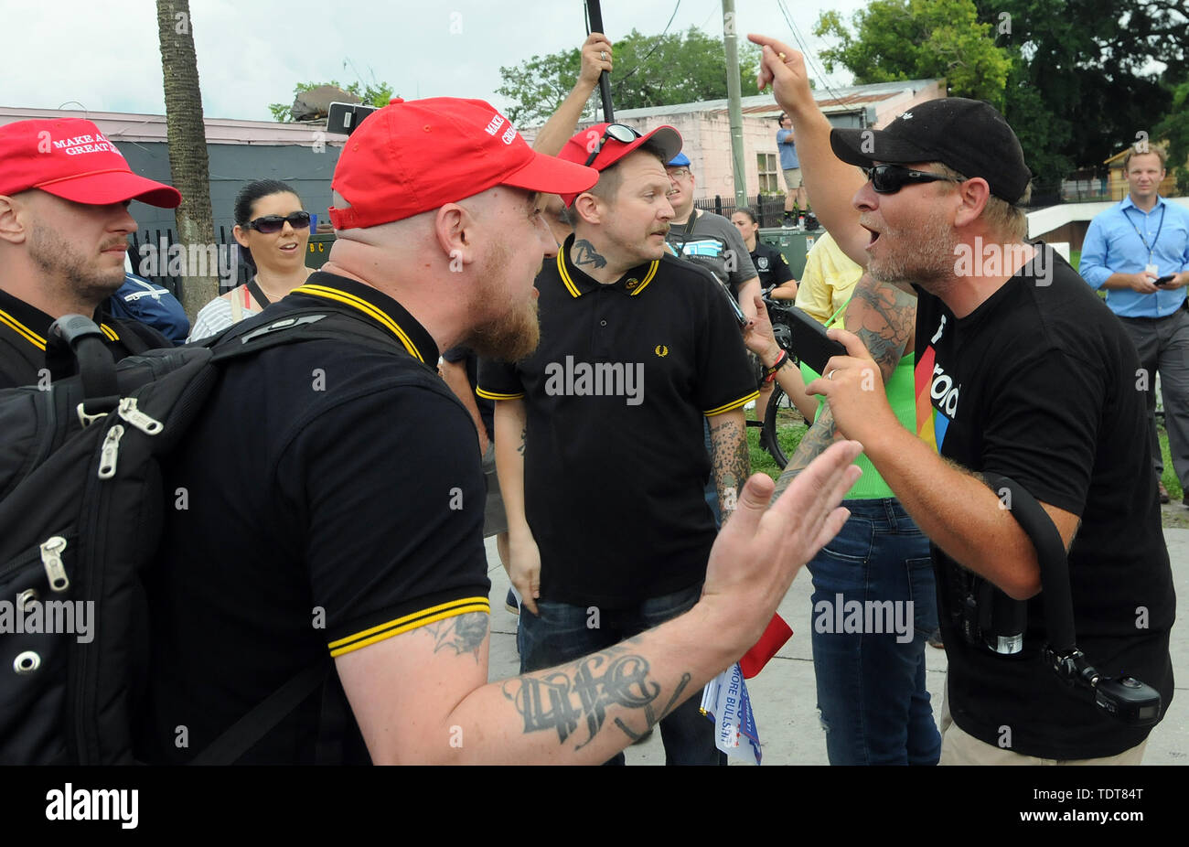 Orlando, Florida, USA. 18th June, 2019. Trump supporters and Trump protesters argue near the site of a Make America Great Again rally at the Amway Center on June 18, 2019 in Orlando, Florida. The rally is billed as U.S. President Donald Trump's kick-off event for his campaign for re-election in 2020. Credit: Paul Hennessy/Alamy Live News Stock Photo