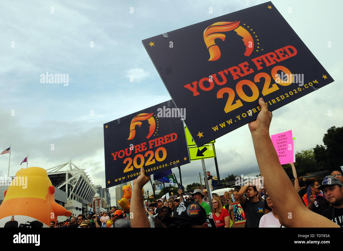 Orlando, Florida, USA. 18th June, 2019. Protesters demonstrate against U.S. President Donald Trump near the site of a Make America Great Again rally at the Amway Center on June 18, 2019 in Orlando, Florida. The rally is billed as Trump's kick-off event for his campaign for re-election in 2020. Credit: Paul Hennessy/Alamy Live News Stock Photo