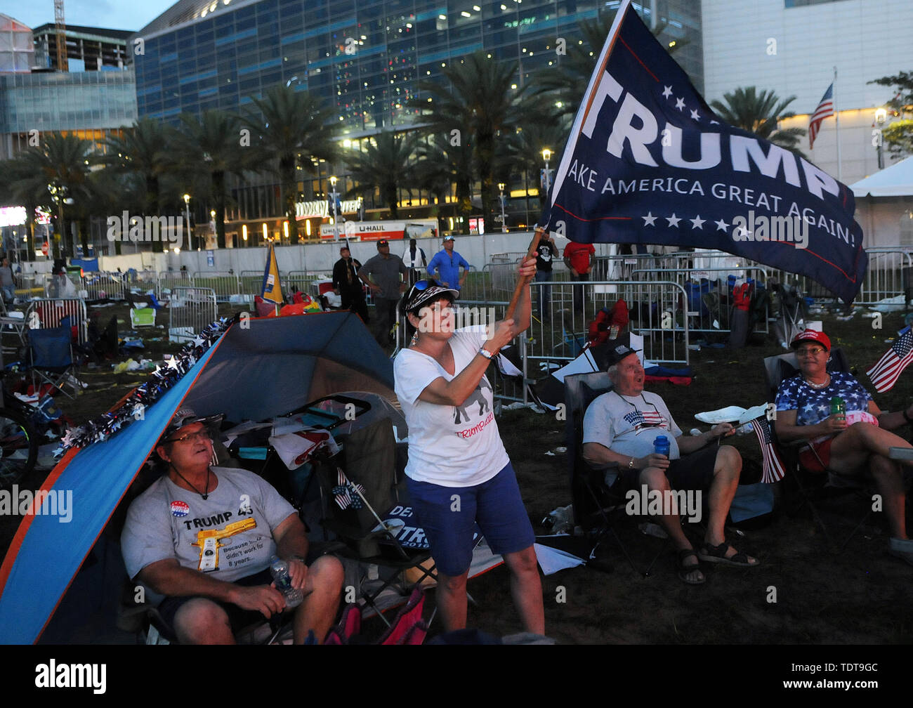 Orlando, Florida, USA. 18th June, 2019. Supporters of U.S. President Donald Trump view Trump's remarks at a Make America Great Again rally on a video screen outside the Amway Center on June 18, 2019 in Orlando, Florida. This is the kick-off event for Trump's campaign for re-election in 2020. Credit: Paul Hennessy/Alamy Live News Stock Photo