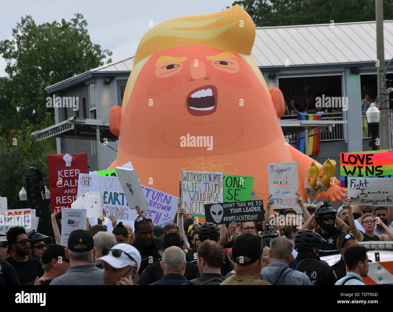 Orlando, Florida, USA. 18th June, 2019. A Baby Trump balloon is inflated at a Trump protest rally near U.S. President Donald Trump's Make America Great Again rally at the Amway Center on June 18, 2019 in Orlando, Florida. This is the kick-off event for Trump's campaign for re-election in 2020. Credit: Paul Hennessy/Alamy Live News Stock Photo