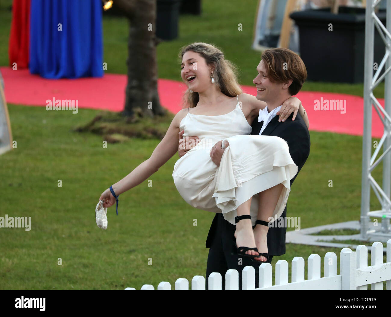 Cambridge, Cambridgeshire, UK. 18th June, 2019. University students celebrating the end of their exams and attending the Trinity May Ball, Cambridge, Cambridgeshire, on June 18, 2019. Credit: Paul Marriott/Alamy Live News Stock Photo