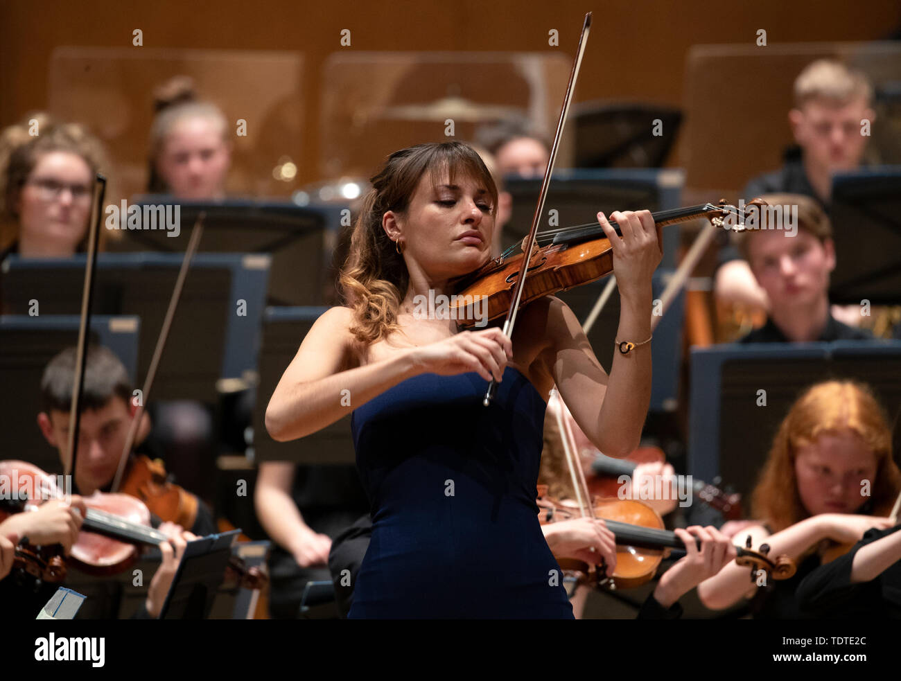 Violinist Nicola Benedetti performs with around 1200 school pupils forming one of the largest orchestras ever assembled in Scotland at a special concert at the 'Play to Learn' event at the Glasgow Royal Concert Hall, Glasgow. Stock Photo