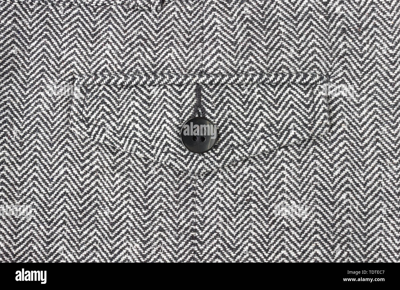 1 Black Button on Zig Zag Pattern or Triangle Pattern on Center Frame. 1 Button on Zig Zag Pattern or Triangle Pattern for apparel design Stock Photo
