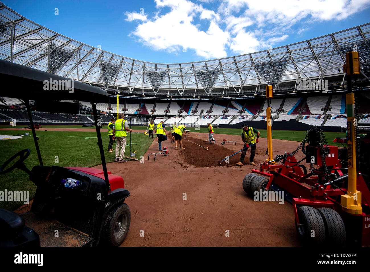 Preparations are made to transform the London Stadium in London from a football pitch to a baseball field, ahead of the first regular season Major League Baseball series to occur in Europe, when Boston Red Sox play New York Yankees. Stock Photo
