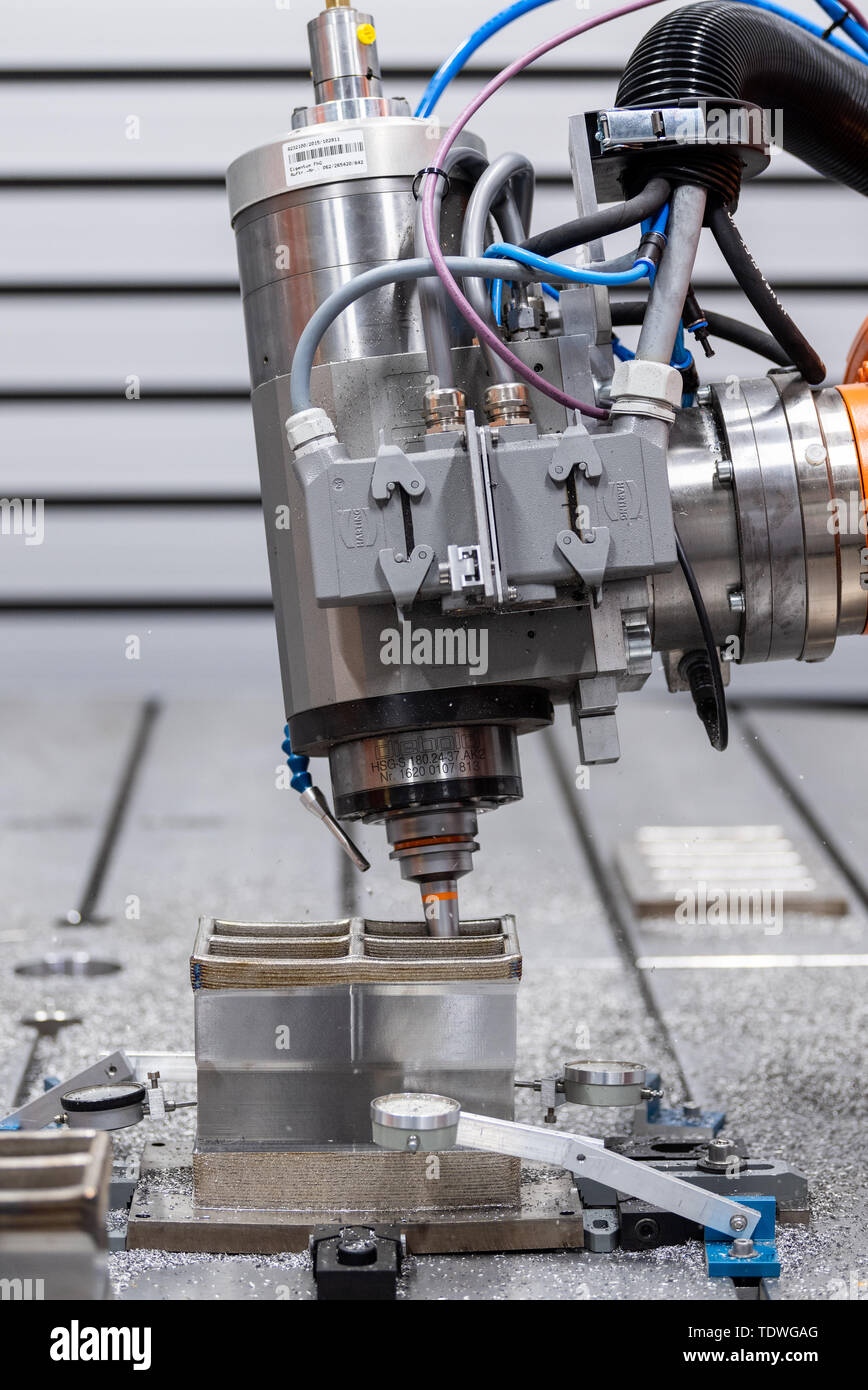 Dresden, Germany. 03rd Apr, 2019. A milling robot in the Additive 