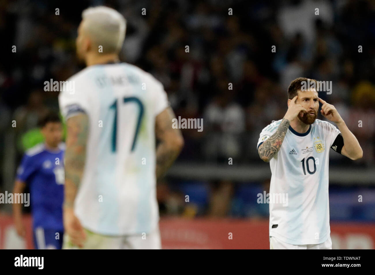 Belo Horizonte, Brazil. 19th June, 2019. Lionel Messi (R) of Argentina reacts during the Copa America 2019 soccer match between Argentina and Paraguay at Mineirao Stadium in Belo Horizonte, Brazil, June 19, 2019. Credit: Lucio Tavora/Xinhua/Alamy Live News Stock Photo