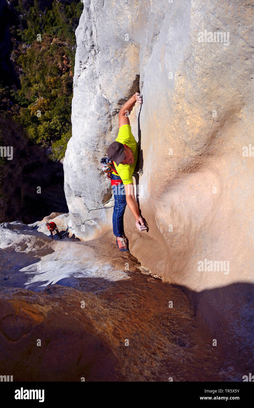 climber at a rock wall in the canyon of Verdon, France, Provence, Canyon Du Verdon Stock Photo