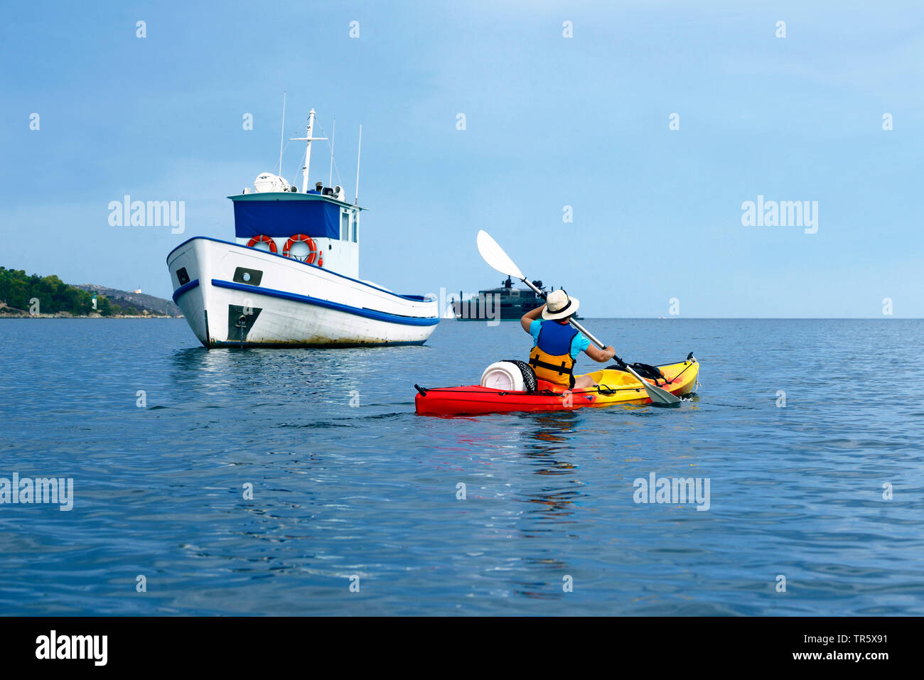 Sea kayaking near the coast, France, Corsica, Agriates, Saint-Florent Stock Photo