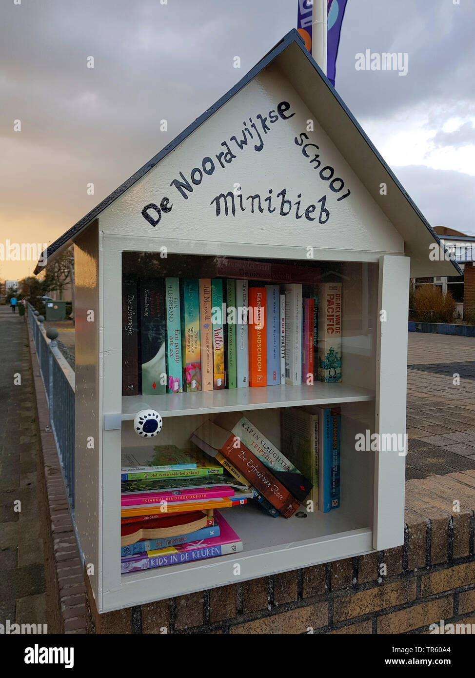 mini library for change of secondhand books in a vacation spot, Netherlands, Noordwijk aan Zee Stock Photo