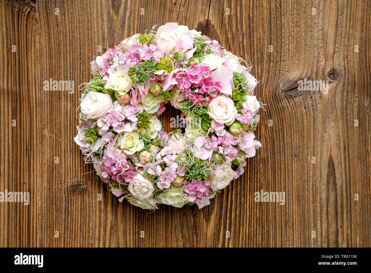 flowers girdle with roses and pinks Stock Photo
