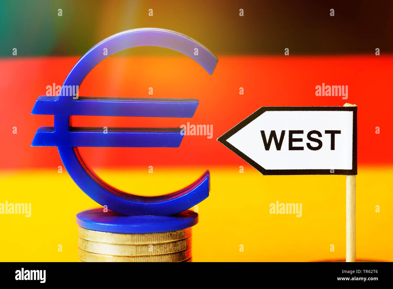 Signpost West And Euro Sign Symbolizing The Unequal Wages Between