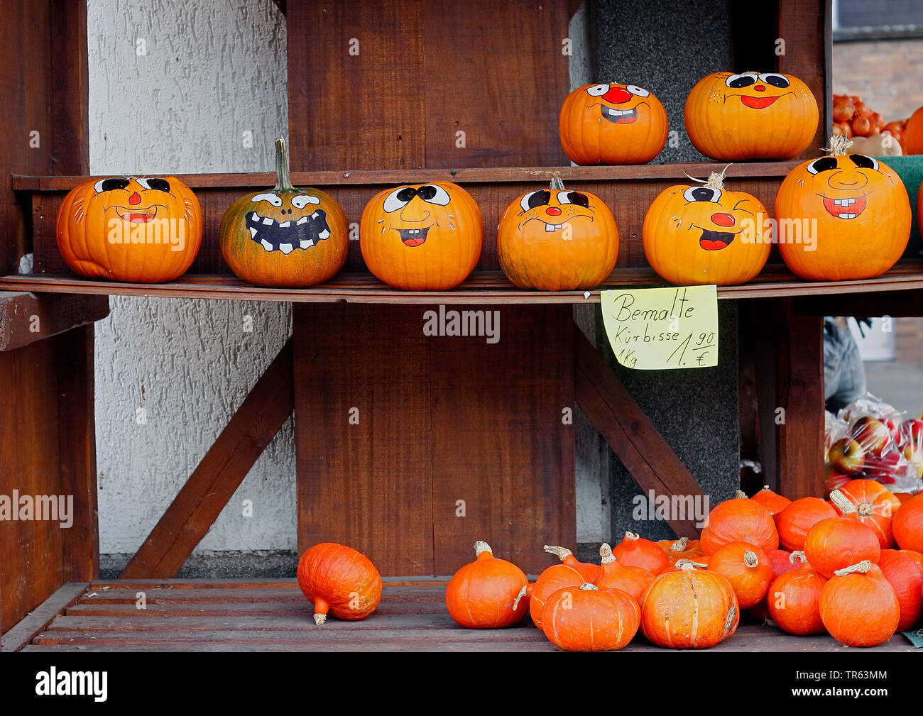 marrow, field pumpkin (Cucurbita pepo), painted faces on pumpkins Stock Photo