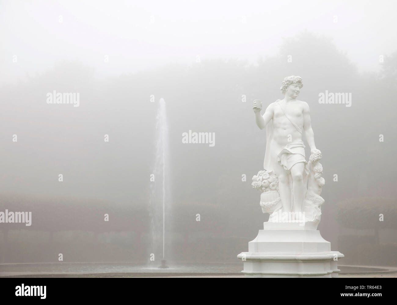 sculpture in the palace garden Augustusburg in fog, Germany, North Rhine-Westphalia, Rhineland, Bruehl Stock Photo