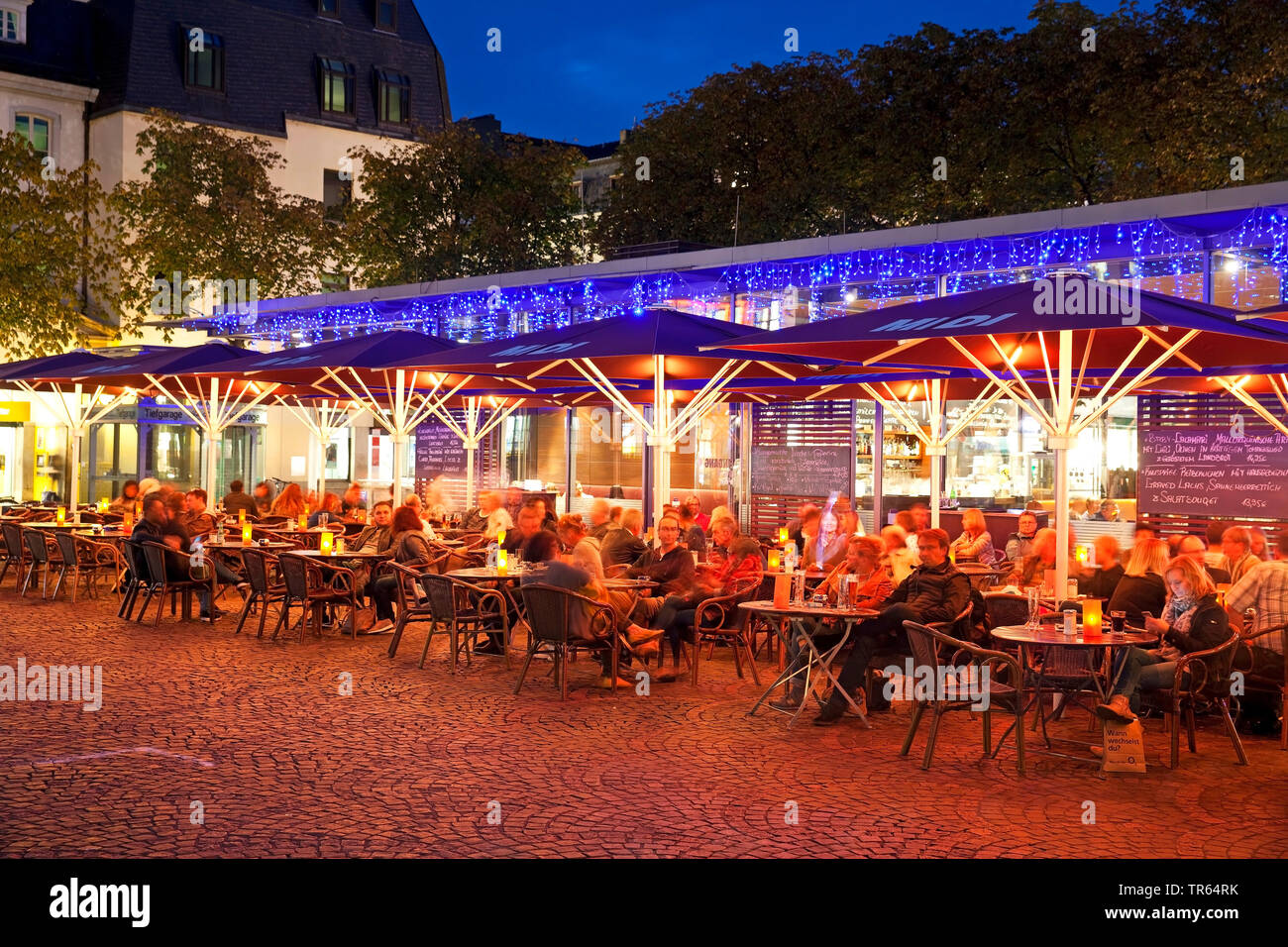 Muensterplatz with pavement cafe in the evening, Germany, North Rhine-Westphalia, Bonn Stock Photo