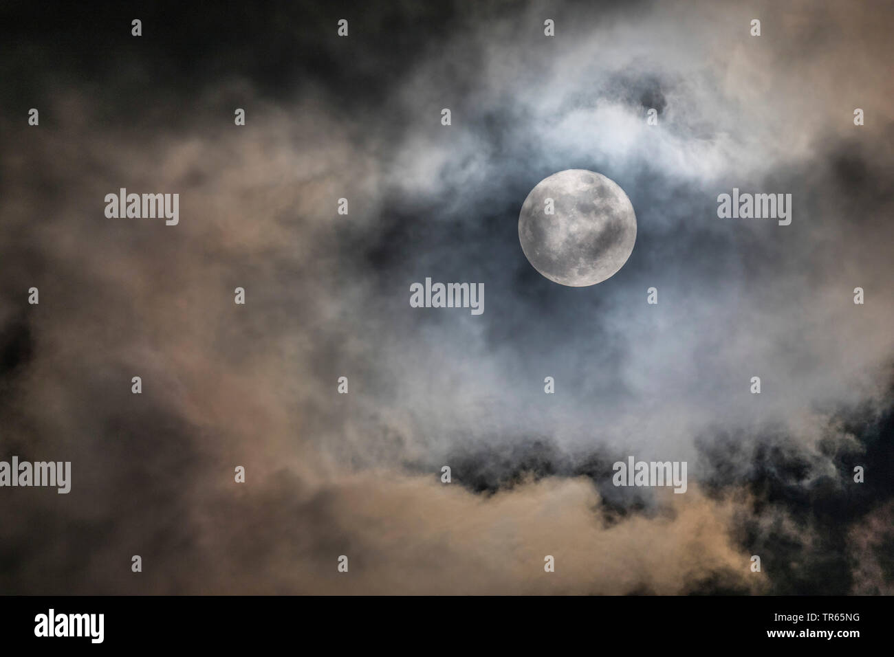 supermoon, partially covered by clouds, 01.01.2018, Germany, Bavaria Stock Photo
