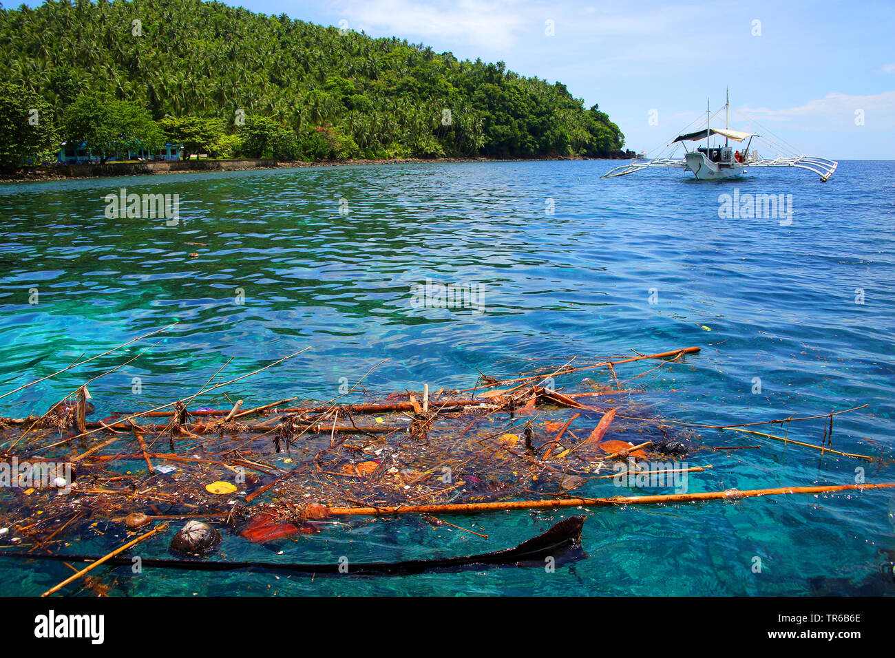 marine debris on water surface in a bay, Philippines, Southern Leyte, Panaon Island, Pintuyan Stock Photo