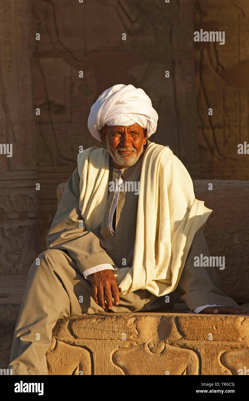 arab sitting at the Temple of Kom Ombo, Egypt, Kom Ombo Stock Photo