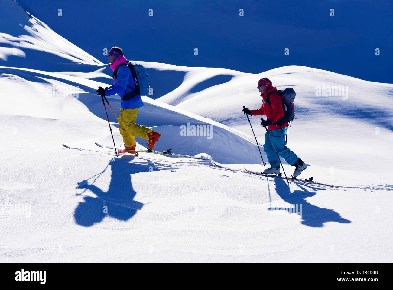 Ski tourers in snowy mountain scenery, France, Savoie, Sainte Foy Tarentaise Stock Photo