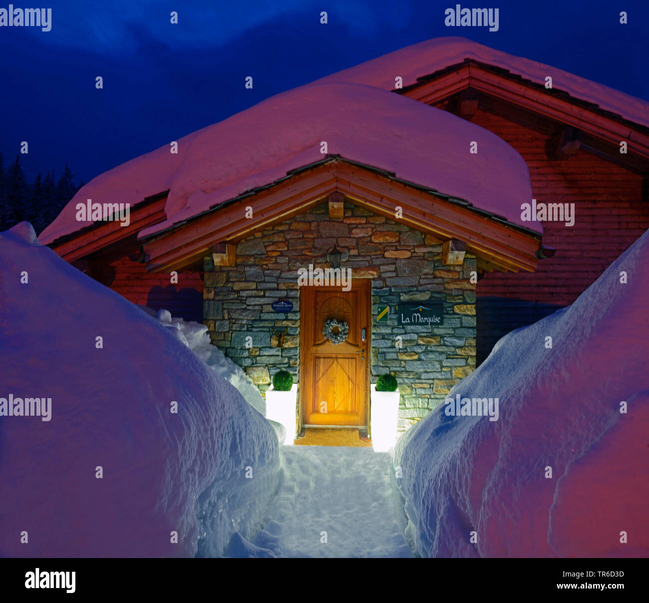 snowy access to a chalet at night, France, Savoie, Sainte Foy Tarentaise Stock Photo