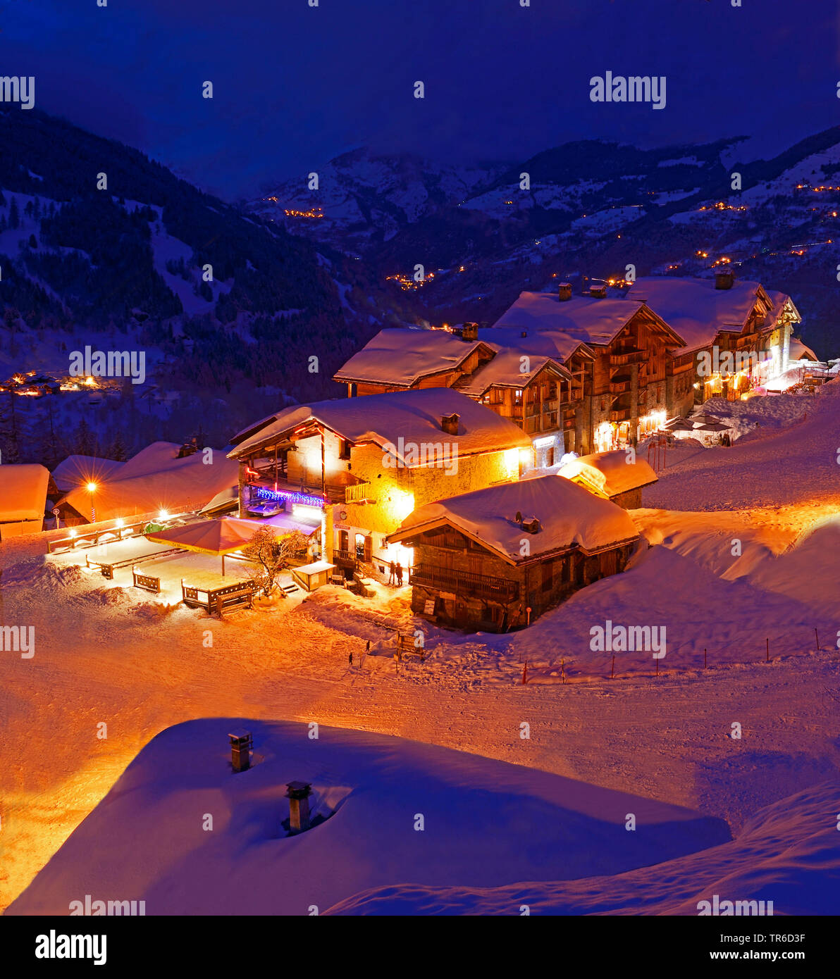 snow-covered ski resort at night, France, Savoie, Sainte Foy Tarentaise Stock Photo
