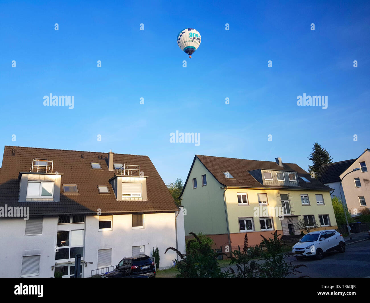 hotair baloon over a city, Germany, North Rhine-Westphalia, Ruhr Area, Witten Stock Photo