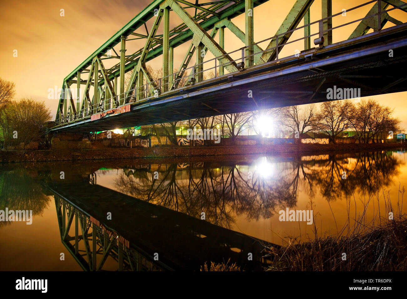 Rhine-Herne Canal with bridge at night in winter, Germany, North Rhine-Westphalia, Ruhr Area, Herne Stock Photo