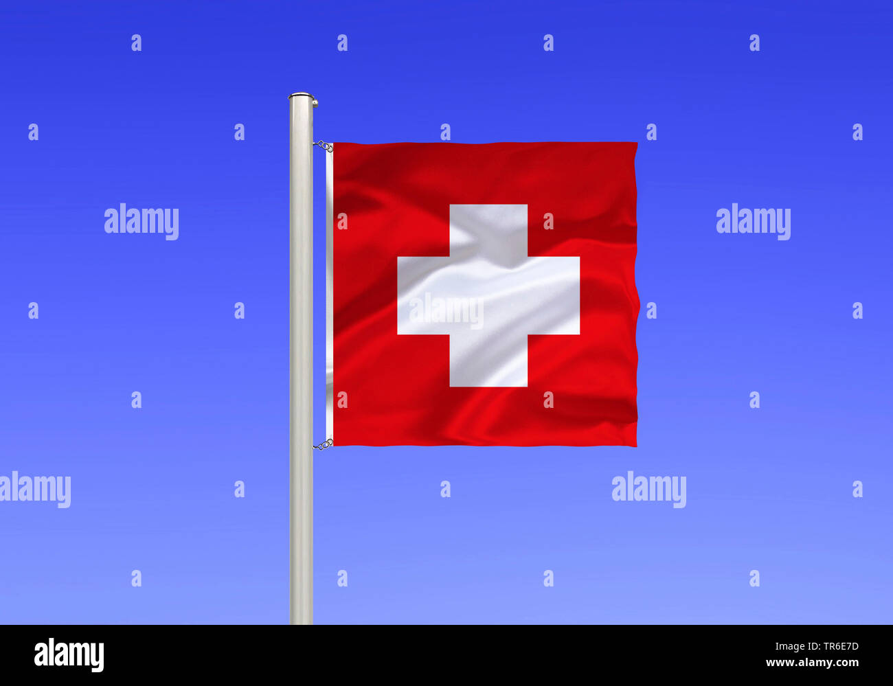 flag of Suisse against blue sky, Switzerland Stock Photo