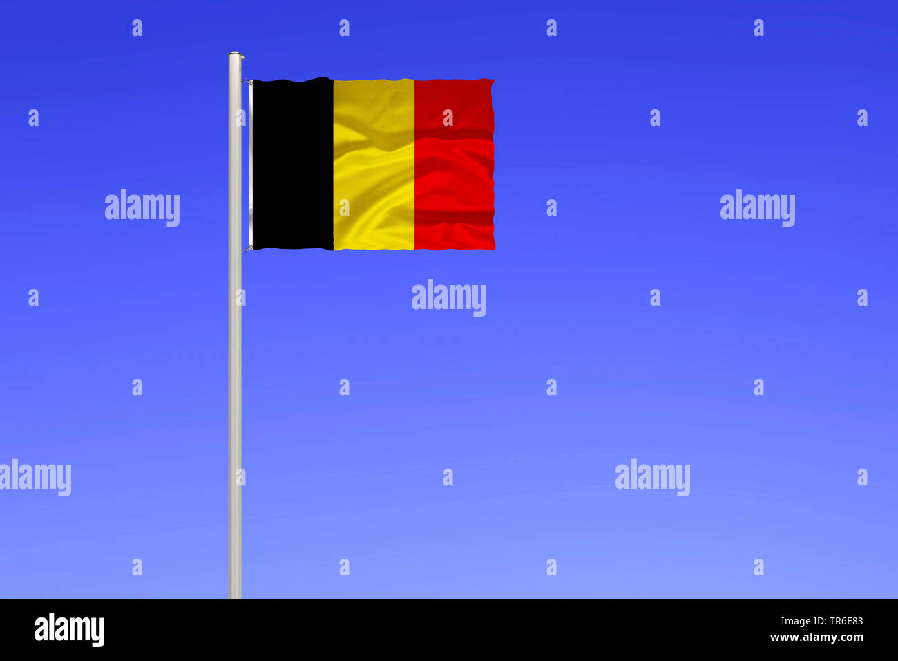 flag of Belgium against blue sky, Belgium Stock Photo
