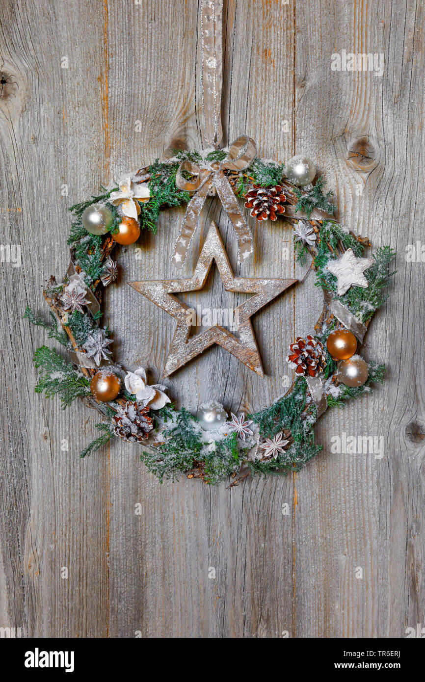 with Advent wreath at a wooden door, Switzerland Stock Photo